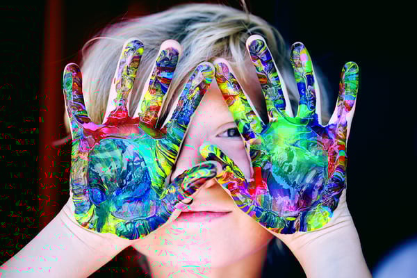 child with finger paint